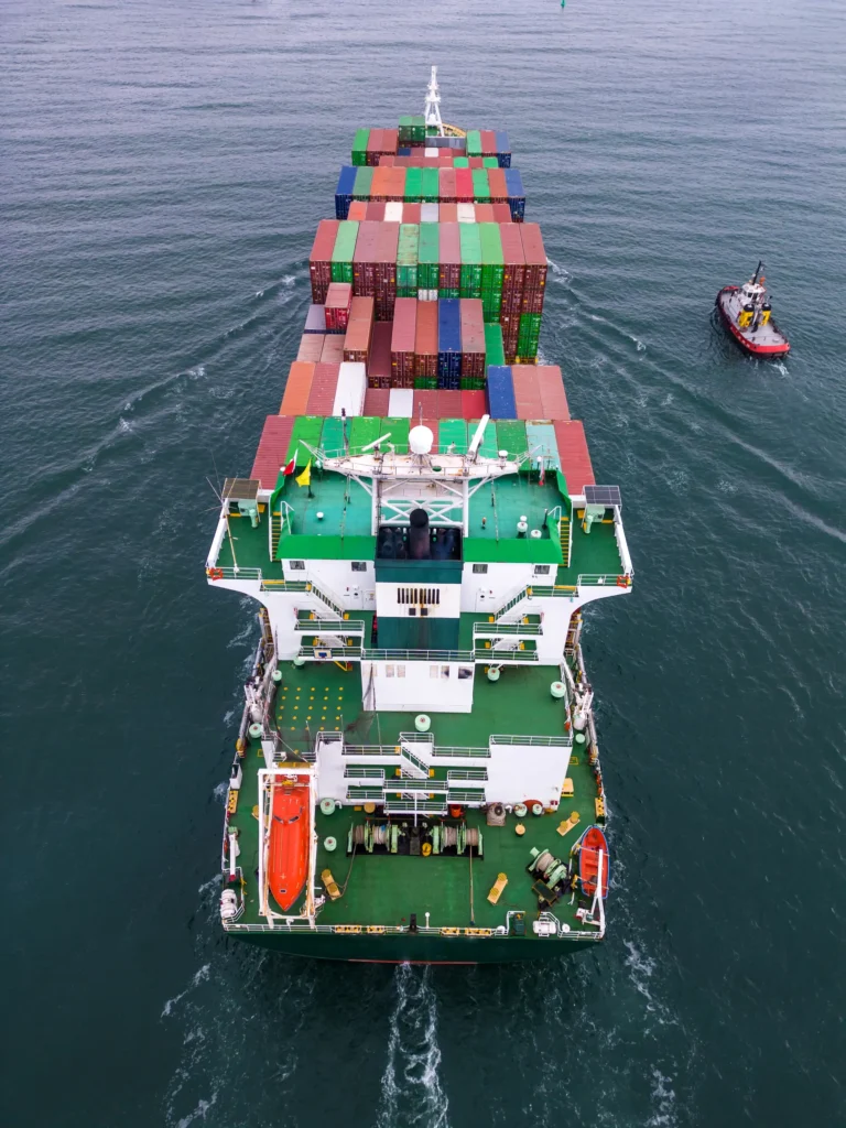 Cargo vessel transporting freight overseas for HS Agency shipping services